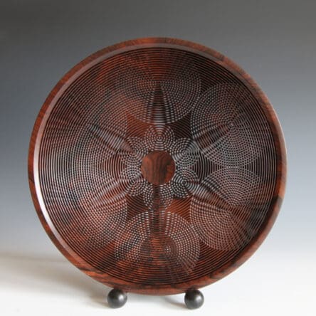 Hans Weissflog, Double Star Bowl, Cocobolo wood. The bowl looks like lace more than it looks like wood. 