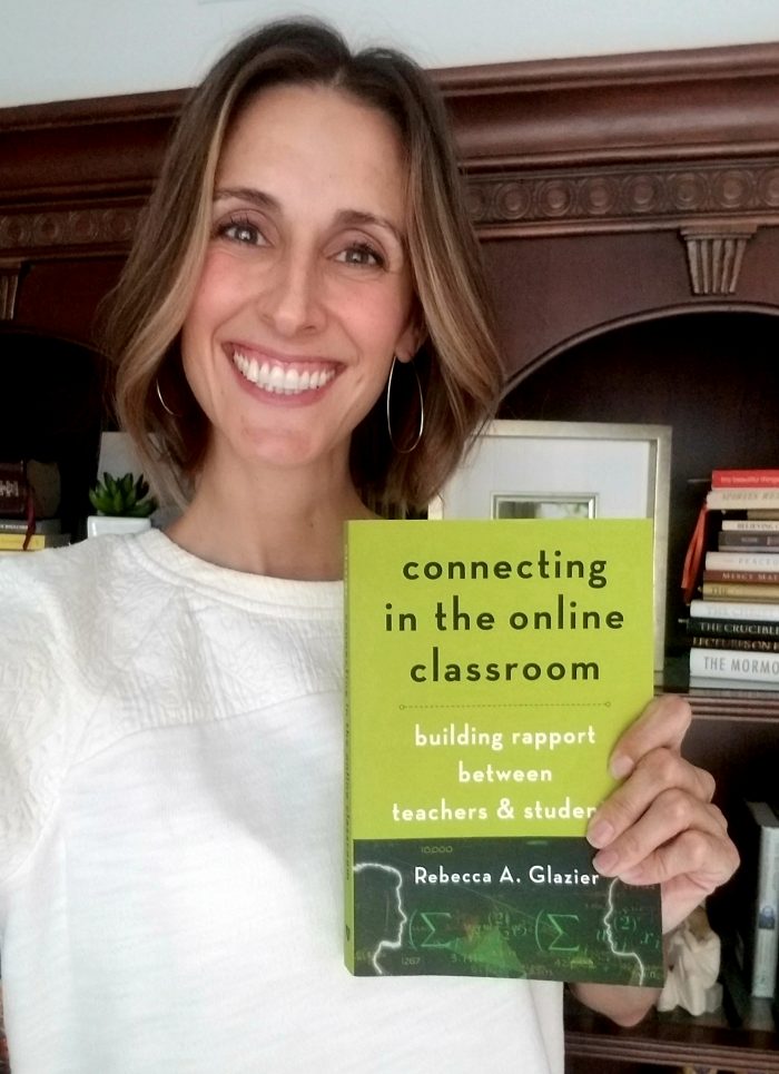 Image of Rebecca Glazier holding her new book