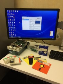 image of the Digital Services Lab's born-digital station with floppy disks from the James Guy Tucker, Jr., Papers.