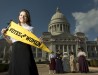 image of AJ Walker completed a service learning appointment with UALR Center for Arkansas History and Culture and conducted research on Florence Cotnam, an Arkansas suffragist. Photographed on February 7, 2017 during the Women's Primary Suffrage Centennial Day celebration at the state capital.