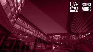 Zoom background image of the Student Services Center, overlaid with maroon and text that says: UA Little Rock | Expect More.