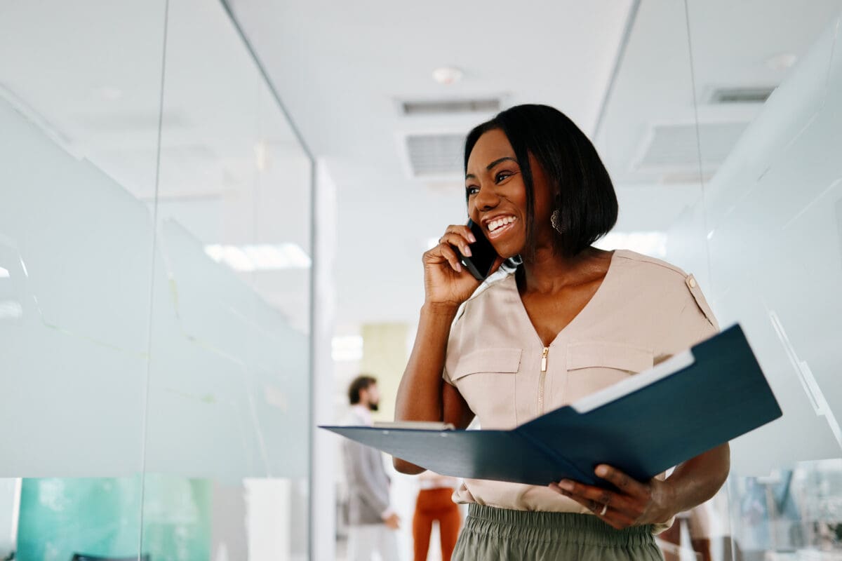 hr-professional-talking-on-phone-holding-folder