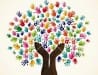 Tree of Life graphic made of colorful handprints