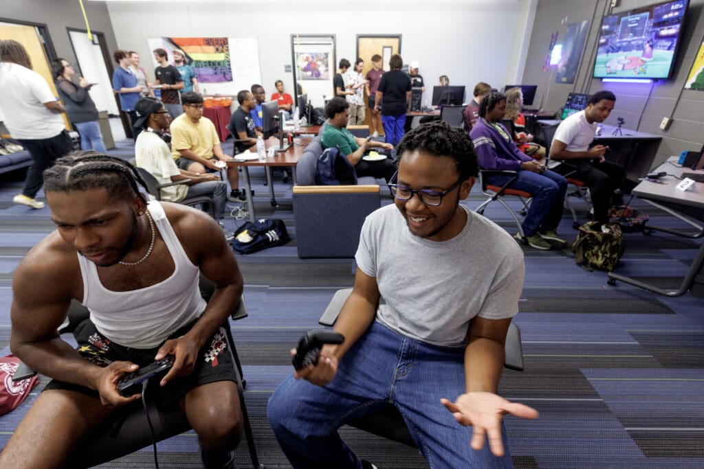 Students participate in an open house of the new Esports Club space, a renovated room in the ETAS building with several video game consoles. Members of the UA Little Rock Esports team competes online with other university teams nationwide.
Photo by Benjamin Krain