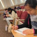 Math students getting ready to solve equations