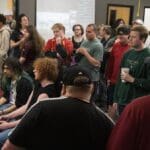 esports participants playing and observing game