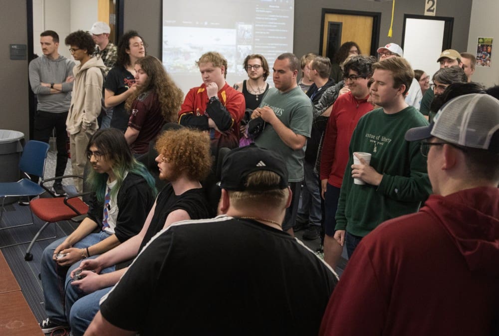 esports participants playing and observing game