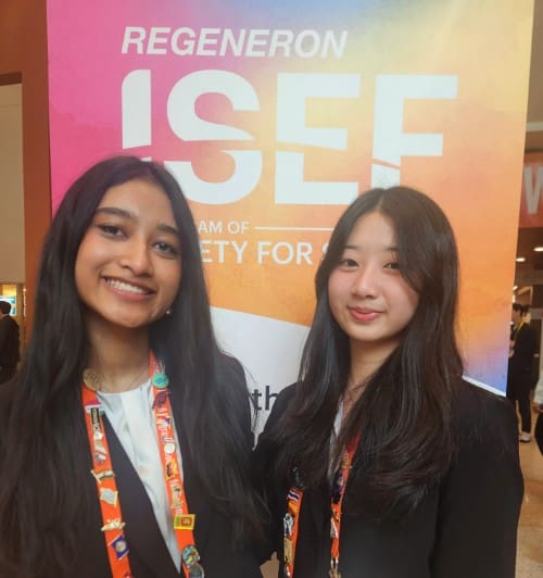 students from central arkansas pose in front of ISEF sign