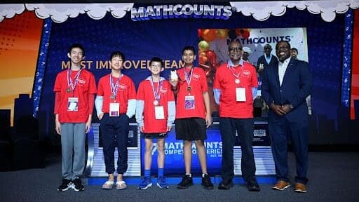Student winners and teachers from Arkansas pose together at the 2026 MATHCOUNTS National Competition.