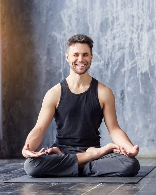 yoga-teacher-male-sitting