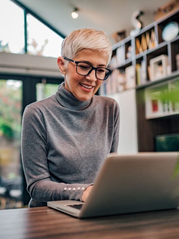 grant-writer-working-at-computer