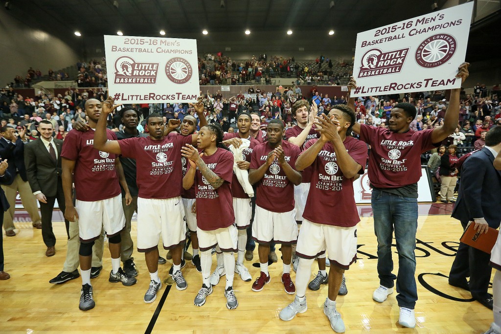 Little Rock Trojans Men's Basketball team celebrating their 2015-2016 championship win at the Jack Stephens Arena. 