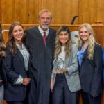 Members of the Bowen Law Mock Trial team along with professor Pat Harris and presiding judge