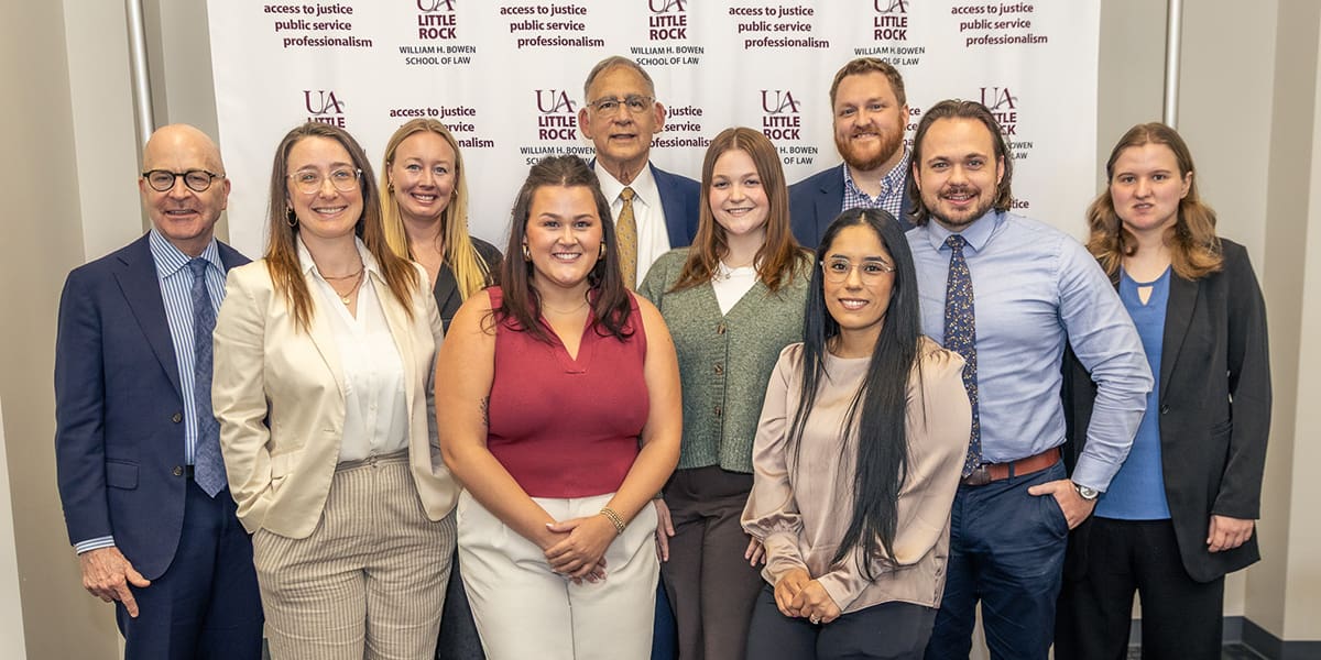 Sen. John Boozman stands with Dean Colin Crawford, Veterans Legal Services Clinic Director Zach Baumgarten, and Bowen law students at the UA Little Rock William H. Bowen School of Law.