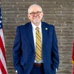 Jim Hudson '96, secretary of the Arkansas Department of Finance and Administration and a graduate of the UA Little Rock William H. Bowen School of Law, poses for a portrait.