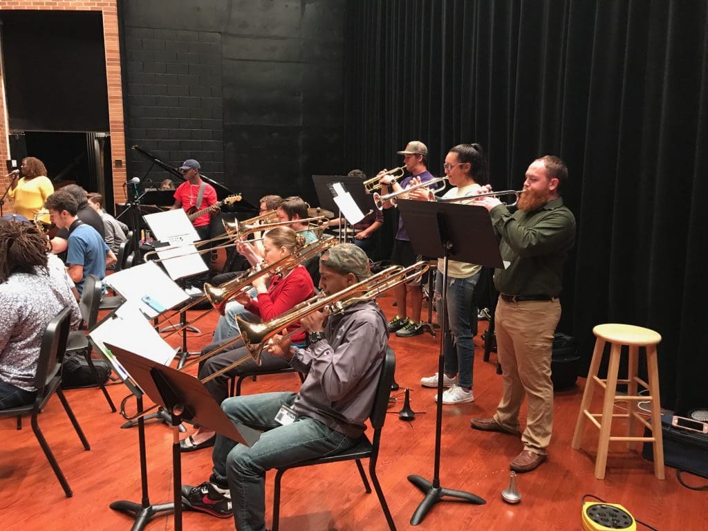 Side angle of the Jazz Ensemble rehearsing