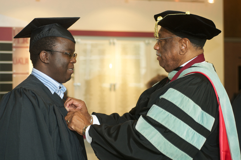 Rwandan Student with Dr. Charles Donaldson, vice chancellor of educational services and student services