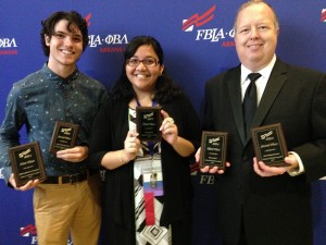 UALR students hold their awards at Future Business Leaders of America