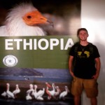 James Sellers poses in front of an Ethiopia sign