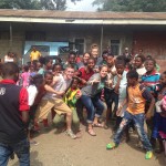 James Sellers is among a group of people posing in Ethiopia