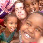 James Sellers surrounded by students during a missions trip to Ethiopia