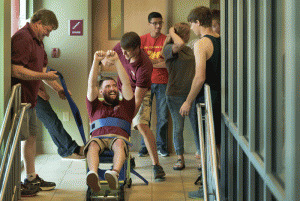 RAs practice stair-descending scenarios during fire training Aug. 7 at UALR's West Hall.