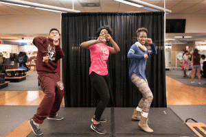 Dancers/models perform during a UALR campus bookstore special event.