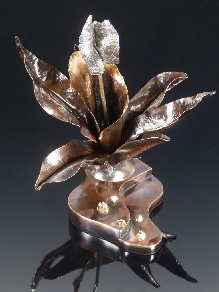 Cast silver flower sculpture