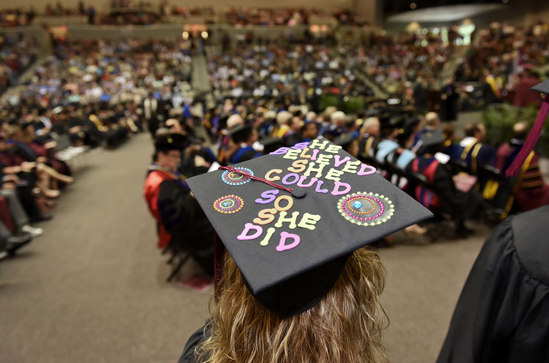 Graduation cap says, "He believed she could so she did"
