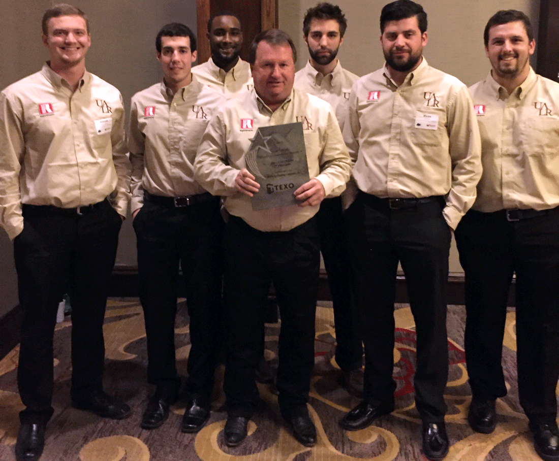 UALR students won second place in the Heavy Civil Division at the Associated Schools of Construction Student Competition in Dallas. From left to right are Joseph Eggburn, Austin Anderson, William Duncanson, Coach Larry Blackmon, Drew Potter, Ryan Hix, and Dylan Singleton.