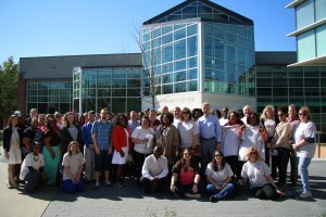 A group shot of the attendees in front of the Donaghey Student Center. 
