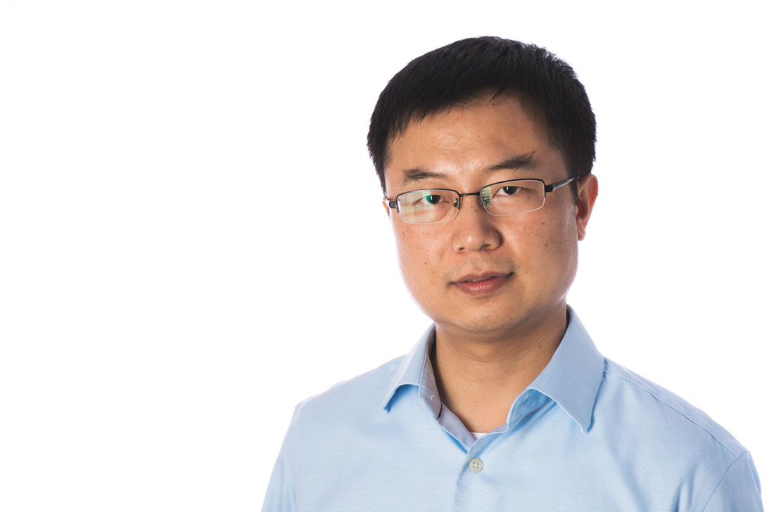 Dr. Mengjun Xie head shot. Xie will help launch a new cybersecurity program at UALR.