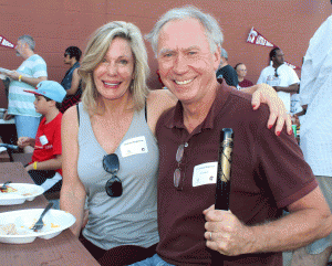 UALR Chancellor Andrew Rogerson and Janessa Rogerson enjoy a night at the ballpark during UALR Alumni Night! at Dickey-Stephens Park.