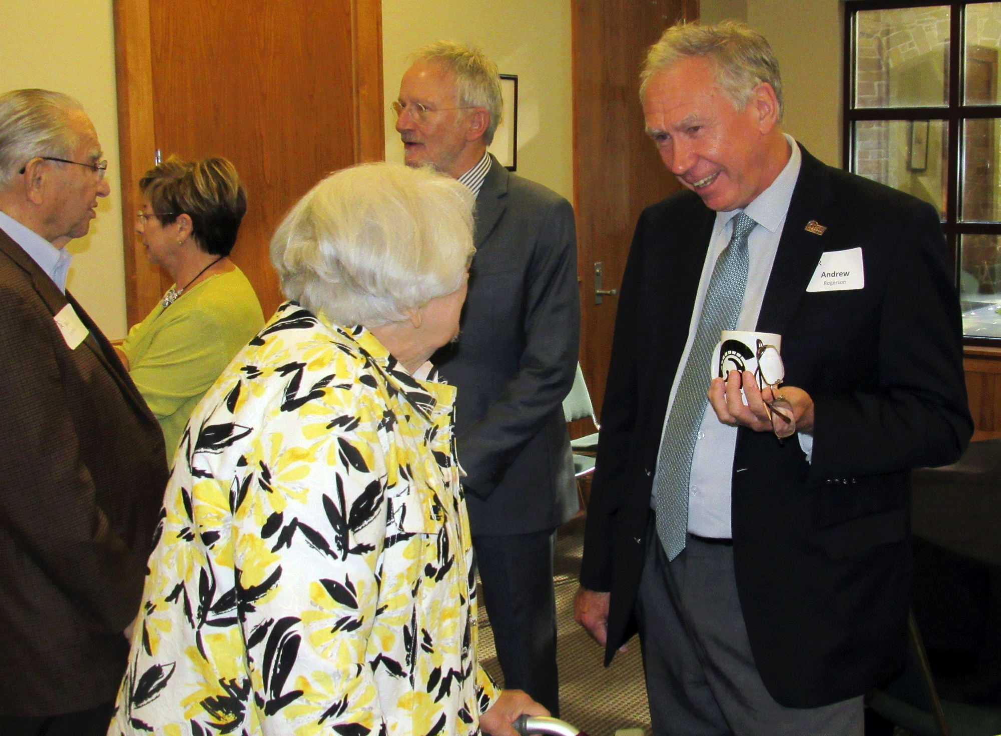 Chancellor Andrew Rogerson (right) talks to Dr. Mary Good (left) during the "Coffee with the Chancellor" event.