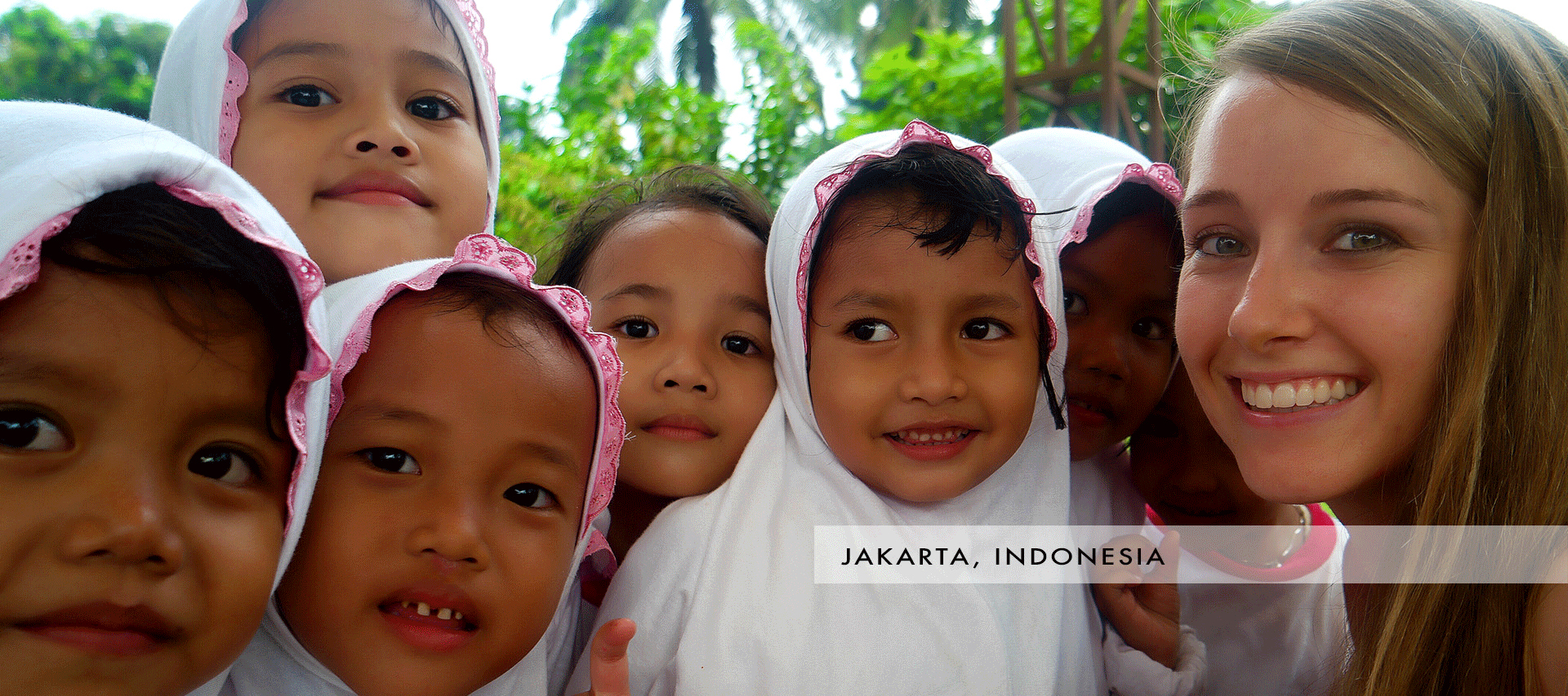 Sarah Dodd visits with schoolchildren in Indonesia. Photo courtesy of Sarah Dodd.
