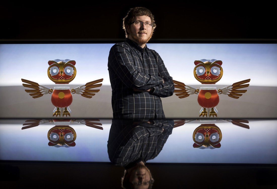 Connor Young, a first-year integrated computing doctoral student from Springdale, is using his research in facial recognition to create “WhoNu,” a virtual owl tour guide that will welcome guests at the Emerging Analytics Center,