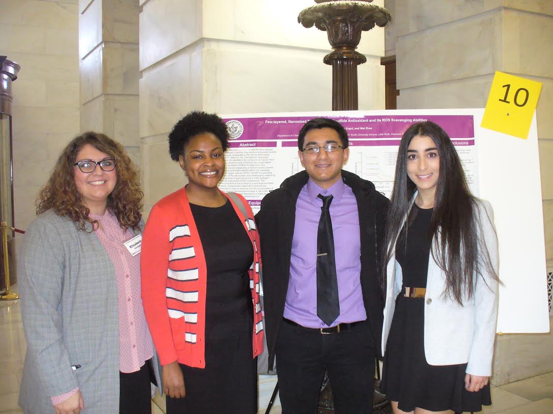 Four of the six students from UA Little Rock who present science, technology, engineering, and mathematics research at the Capitol.