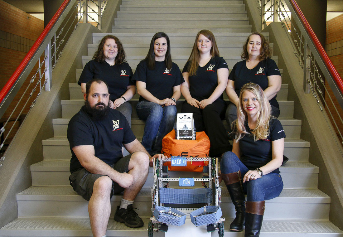 The Just a Prototype robotics team members include: Back row (L-R) Jamie Burrows, Rachel Smith, Shala Nail, and Donetha Groover. Front row (L-R) David Shurley , FLN the robot, and Faculty Advisor Sandra Leiterman.