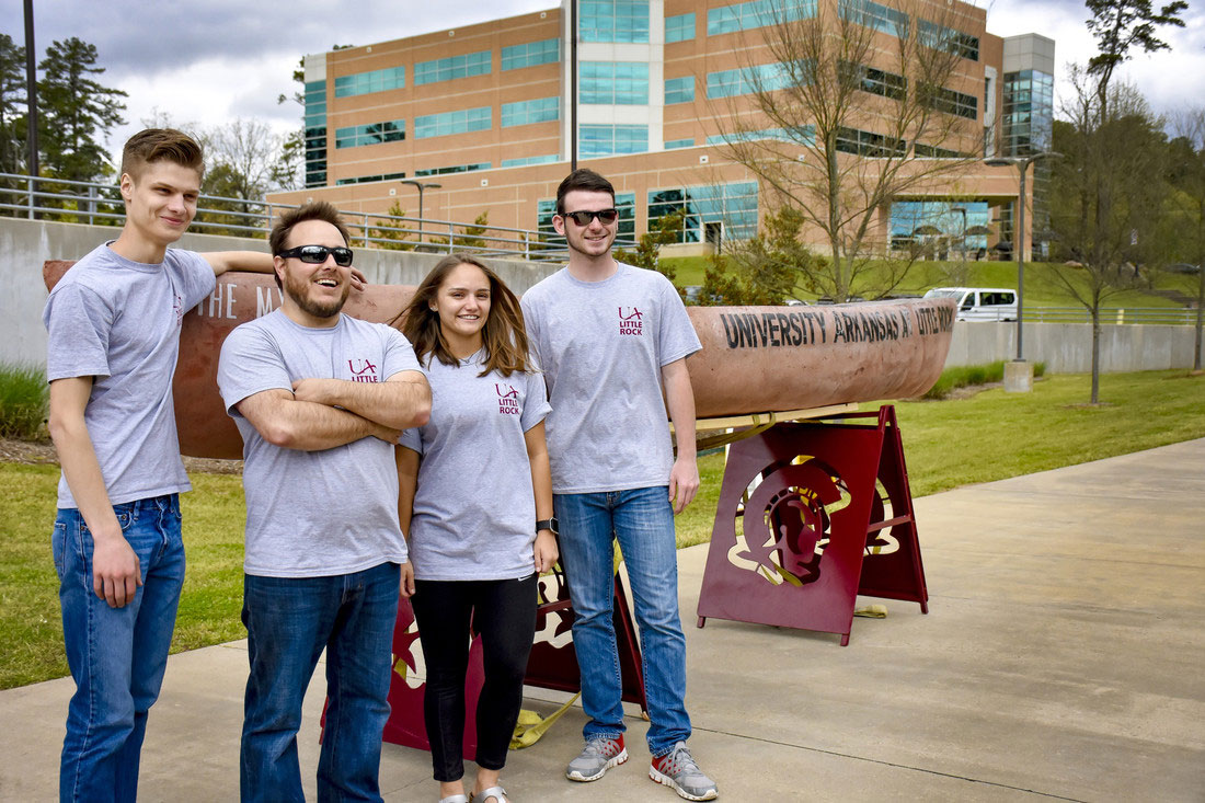 University of Arkansas at Little Rock students display a concrete canoe built for the American Society of Civil Engineers Deep South Conference. Team members (L-R) include Logan Snapp, Manvill Allen, Harrison Hayworth, and Hunter Hobby. Photo by Joe Kline Jr./UA Little Rock Communications.