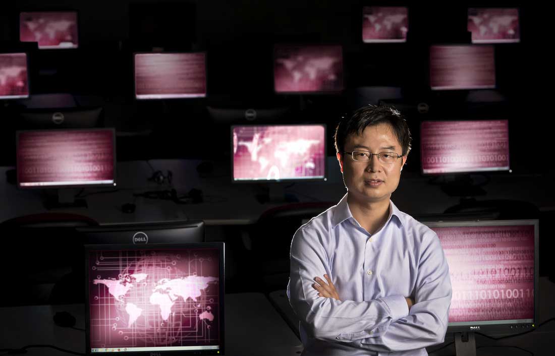 Dr. Mengjun Xie, who is developing a cybersecurity lab.