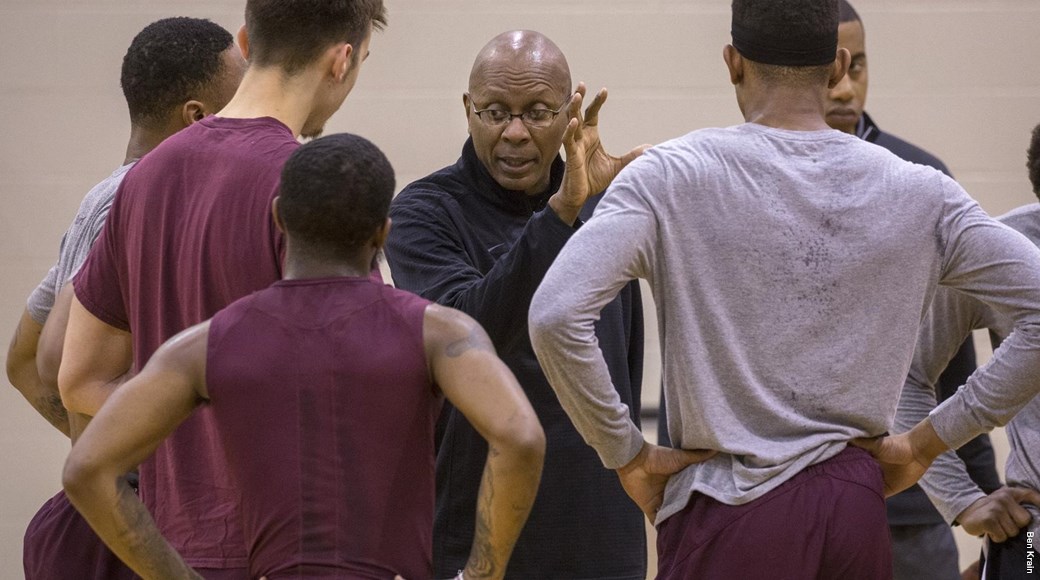 Head Coach Darrell Walker talks with UA Little Rock basketball players.