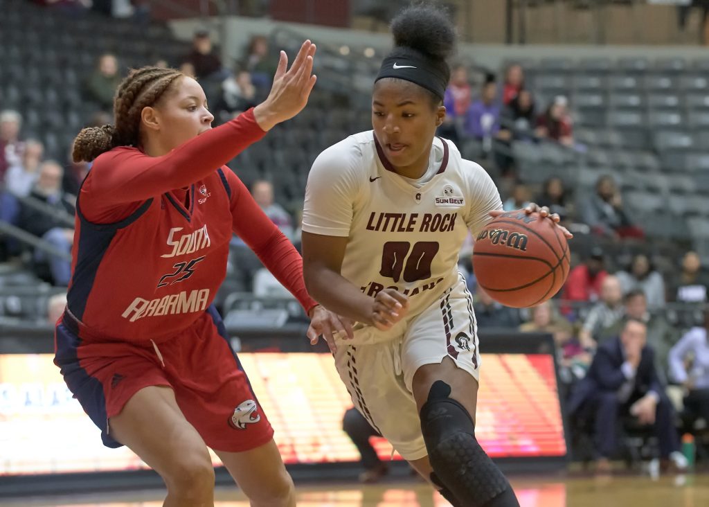 UA Little Rock women's basketball player Ronjanae DeGray (right) battles against South Alabama. 