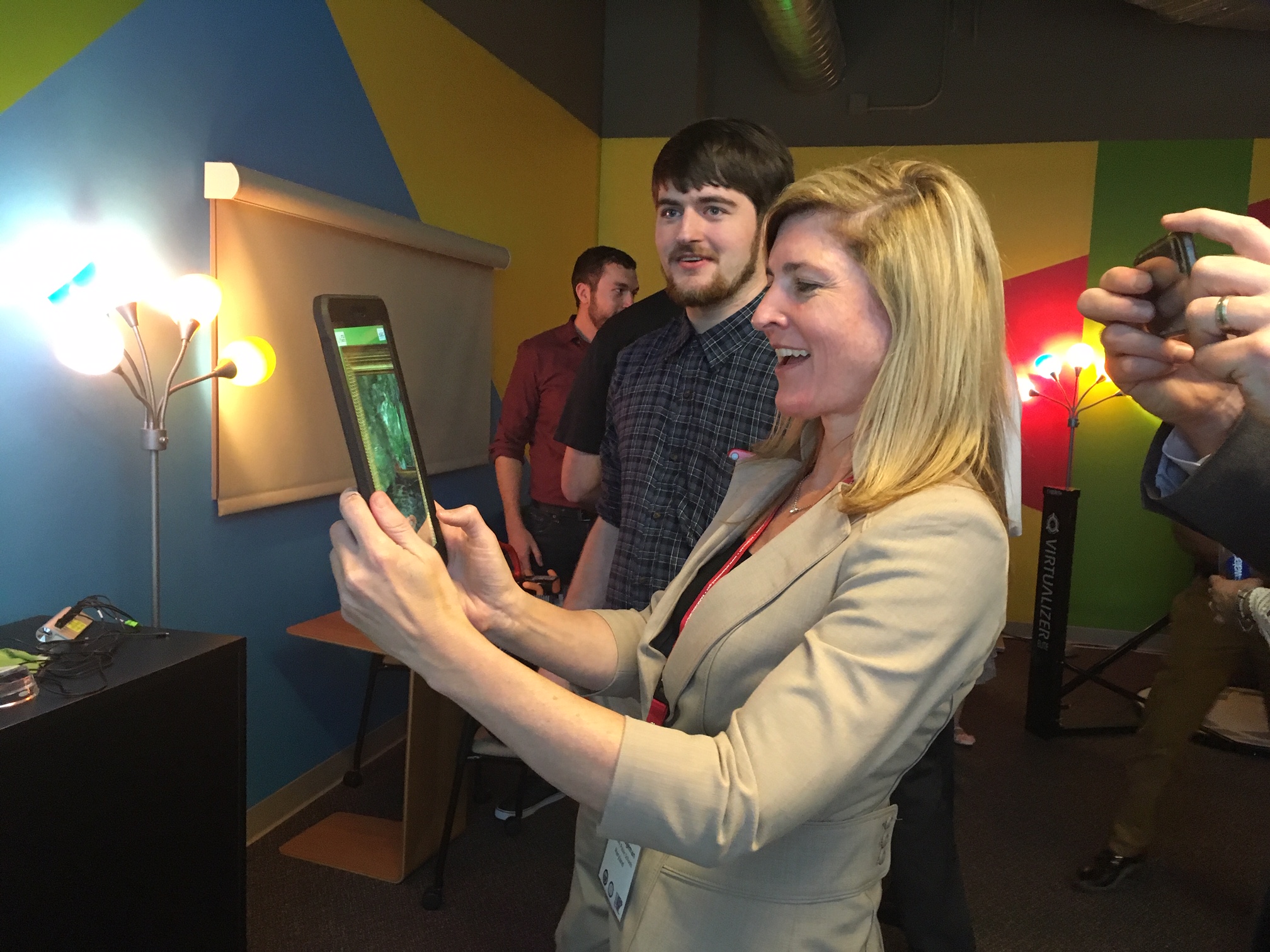 Heather Lageman, a summit participant and executive director of leadership development at Baltimore County Public Schools, uses an educational augmented reality application targeted to art museums.