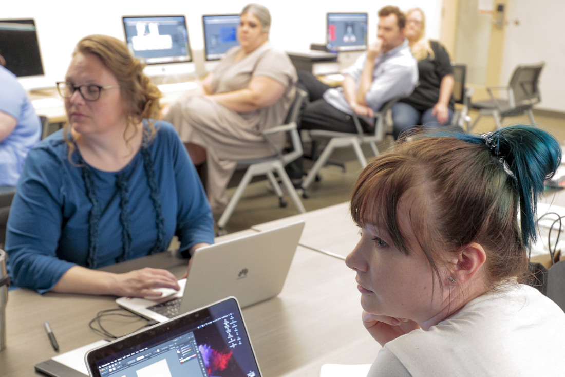 Art educators from around the state participate in a free professional development summer workshop for graphic design at UA Little Rock. Photo by Ben Krain.