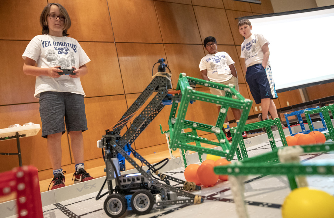 Teams of students in grades 3-8 prepare their robots to compete in the filed challenge in the VEX IQ Advanced Robotics Camp. Photo by Ben Krain.