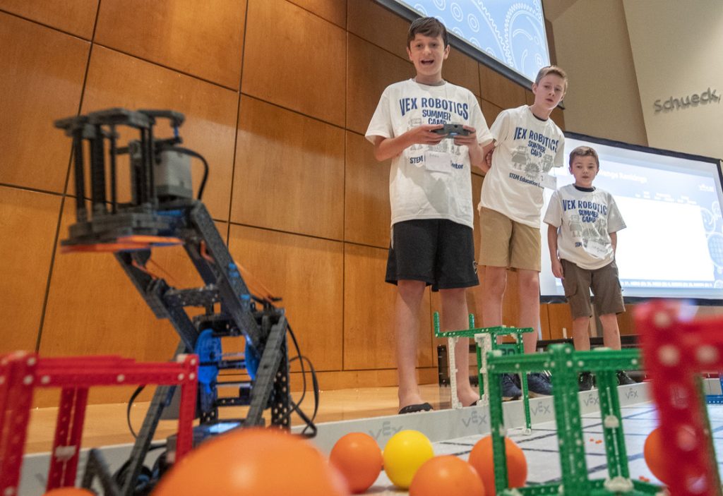 Teams of students in grades 3-8 prepare their robots to compete in the filed challenge in the VEX IQ Advanced Robotics Camp. Photo by Ben Krain. 