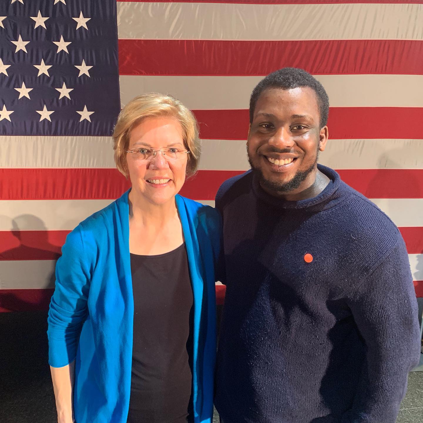 UA Little Rock alum Brian Gregory, right, is working on the presidential campaign of Sen. Elizabeth Warren, left, in Iowa.