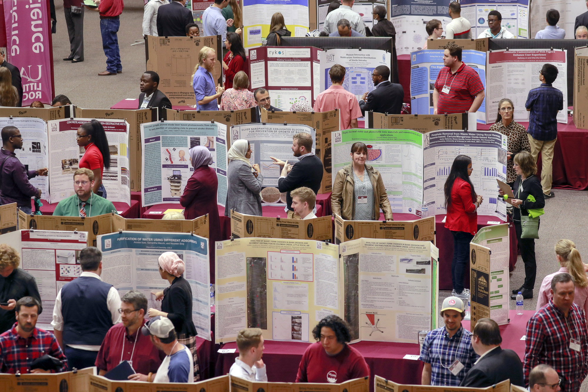 Students present their research projects during the Research and Creative Works event.