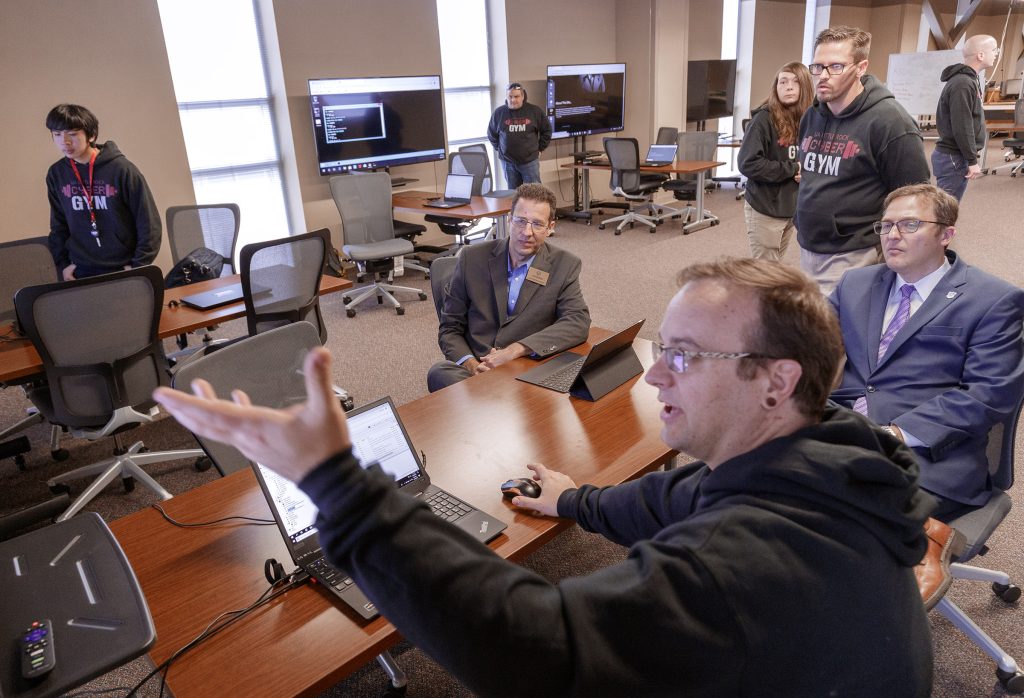 UA Little Rock students demonstrate the university’s cloud-based cybersecurity lab, the Cyber Gym. Photo by Ben Krain. 