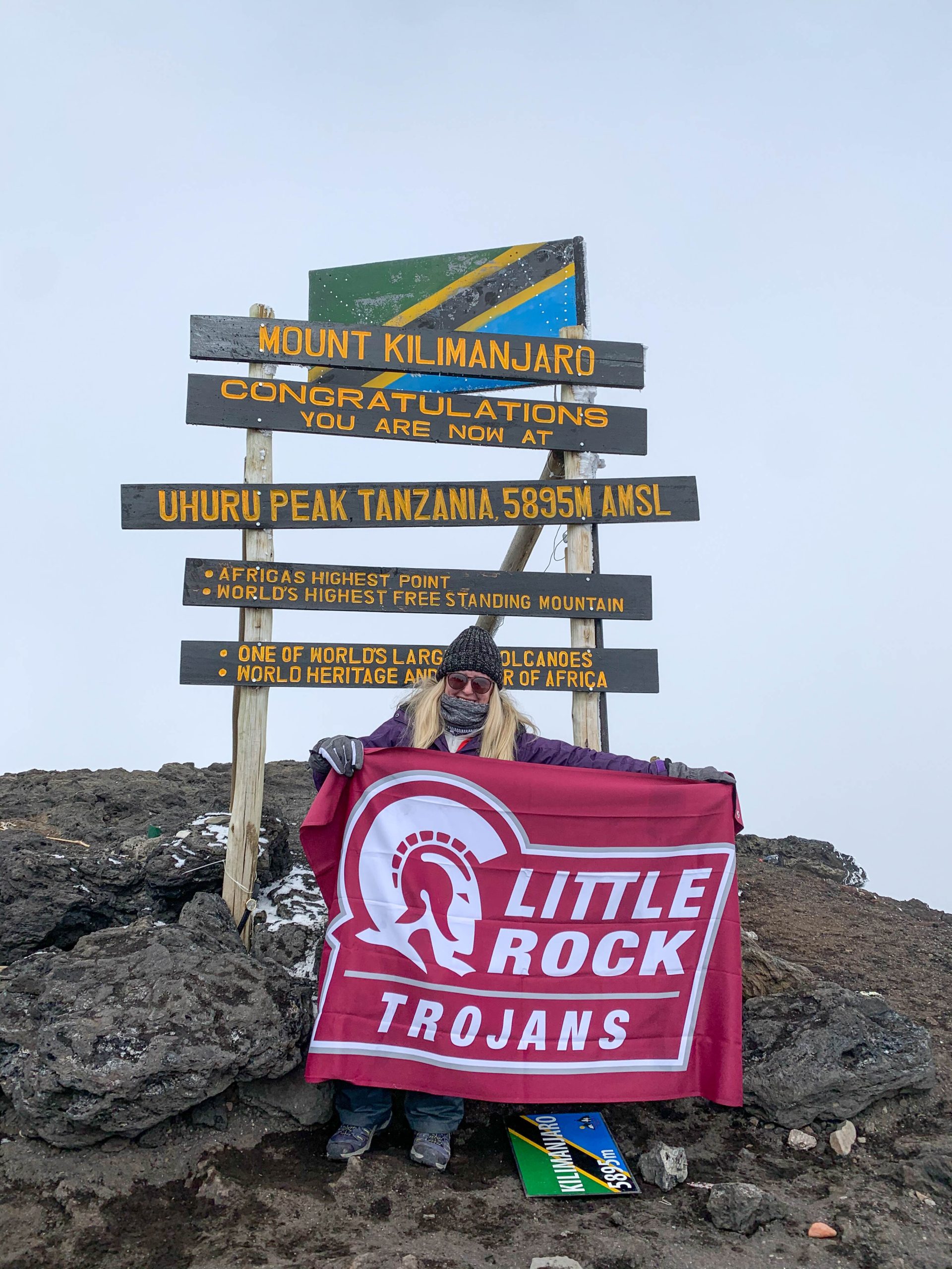 Coach Wylie flies UA Little Rock flag on Mount Kilimanjaro.